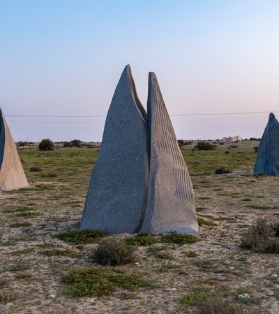 three marble sculptures with a manifold shape