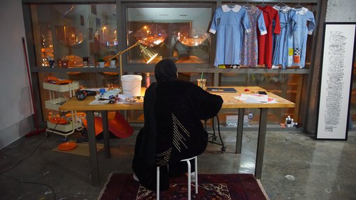 Artist Maryam Alameri working in her studio at the Fire Station.