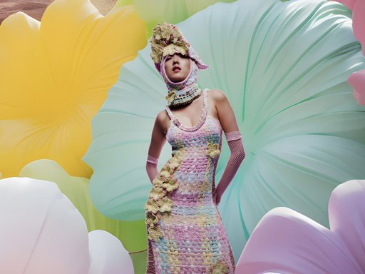 Model standing infront of colorful background