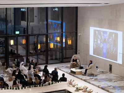 Top view of a talk with two speakers and audience.