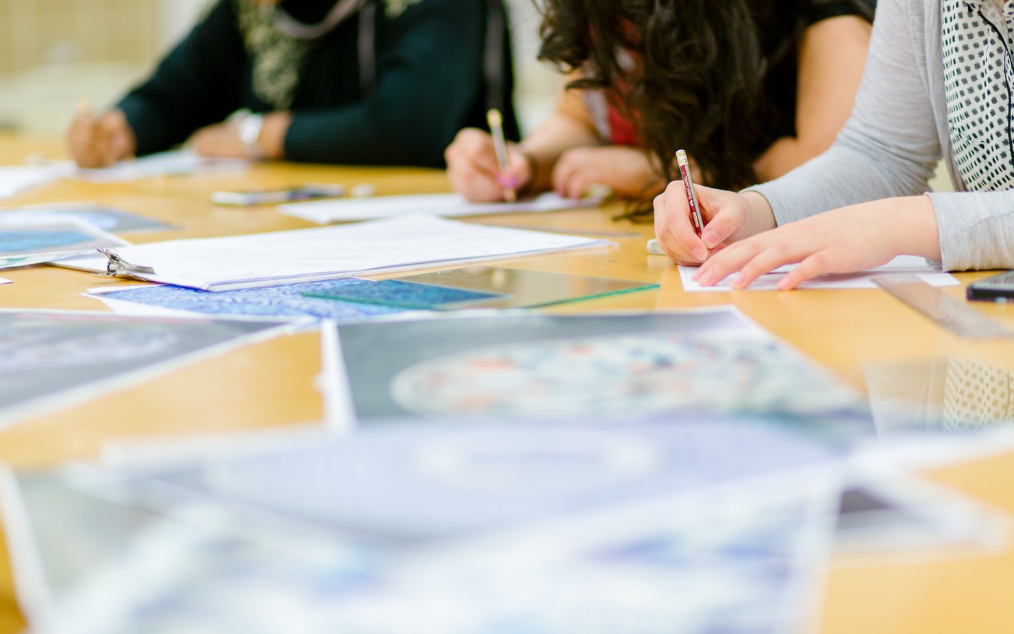 A group participating in a drawing workshop