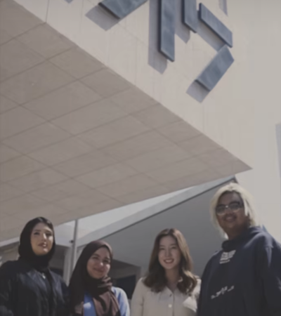 Group photo in front of a building outside