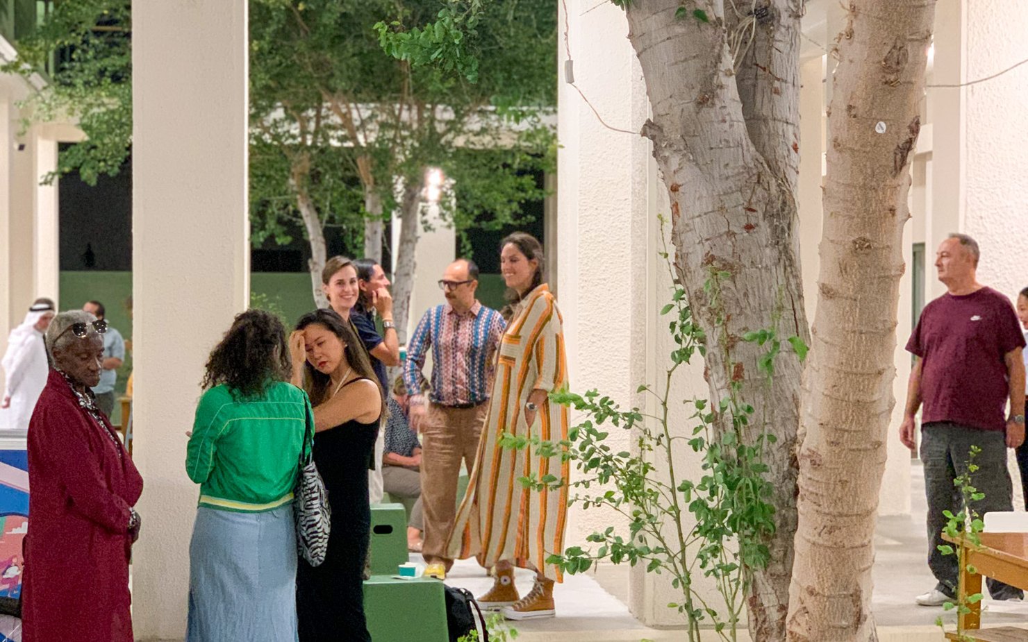 people standing in a courtyard