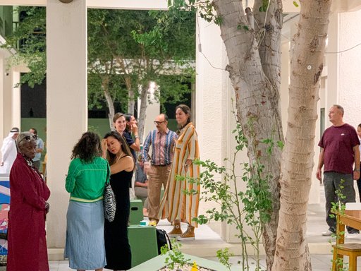 people standing in a courtyard