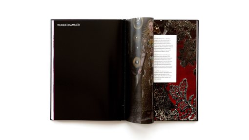 Two page spread of the Forever Valentino exhibition catalogue