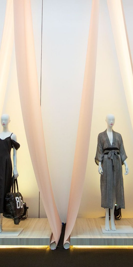 Group of mannequins in a tent like structure
