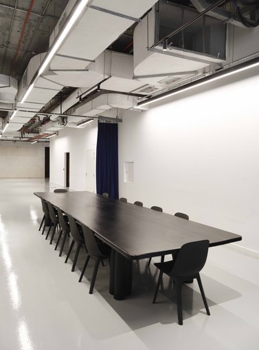 Long black table with seats