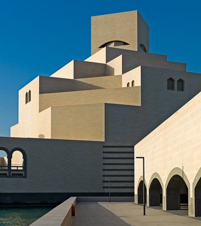 The exterior of the Museum of Islamic Art (MIA) showcasing its cream-coloured limestone and geometric five storeys