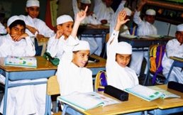 Old photograph depicting school boys in traditional clothes