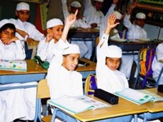 Old photograph depicting school boys in traditional clothes