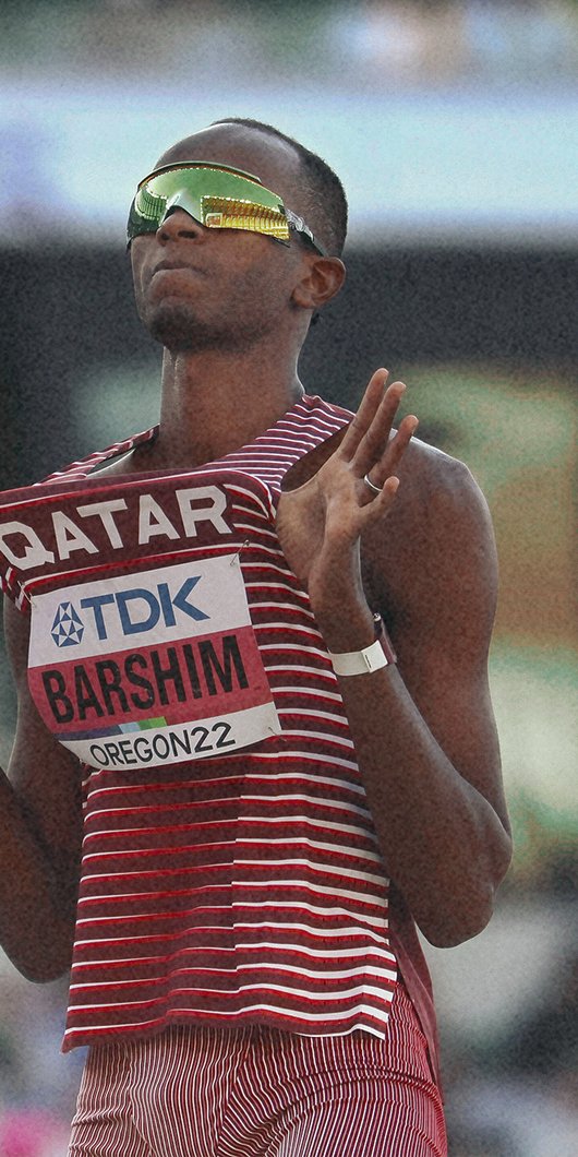 player and athlete holding his t-shirt