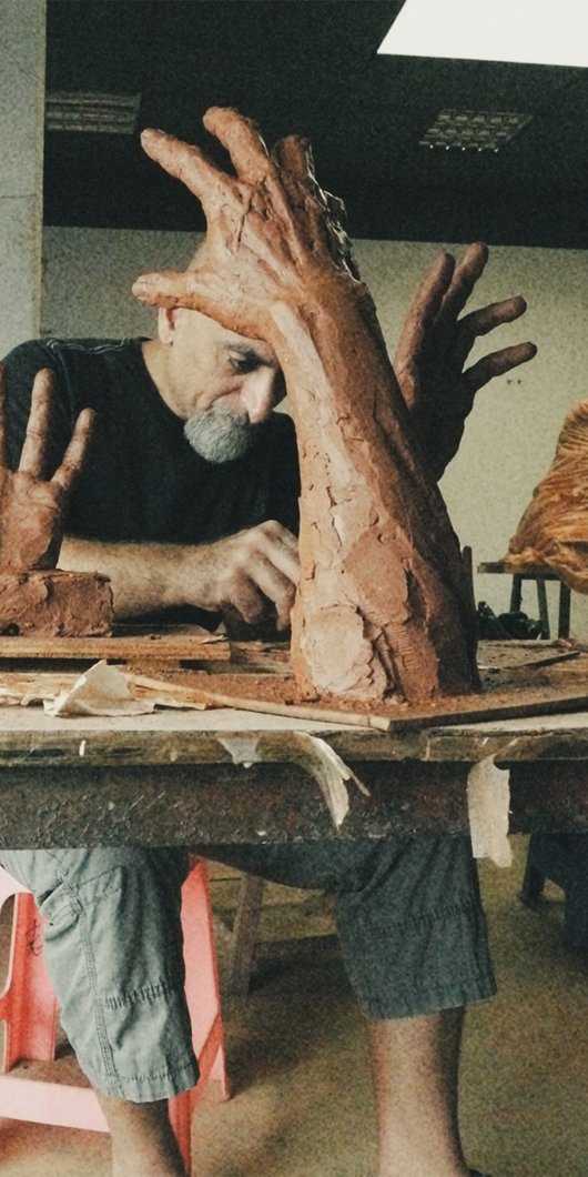 artist doing sculpture