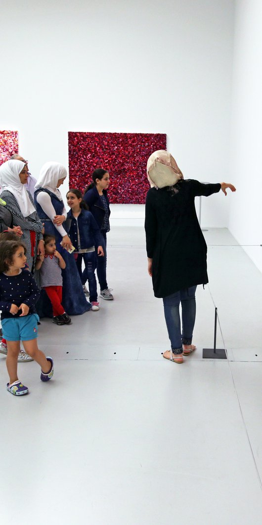 A group of school children visit Mathaf as part of the Years of Culture programme