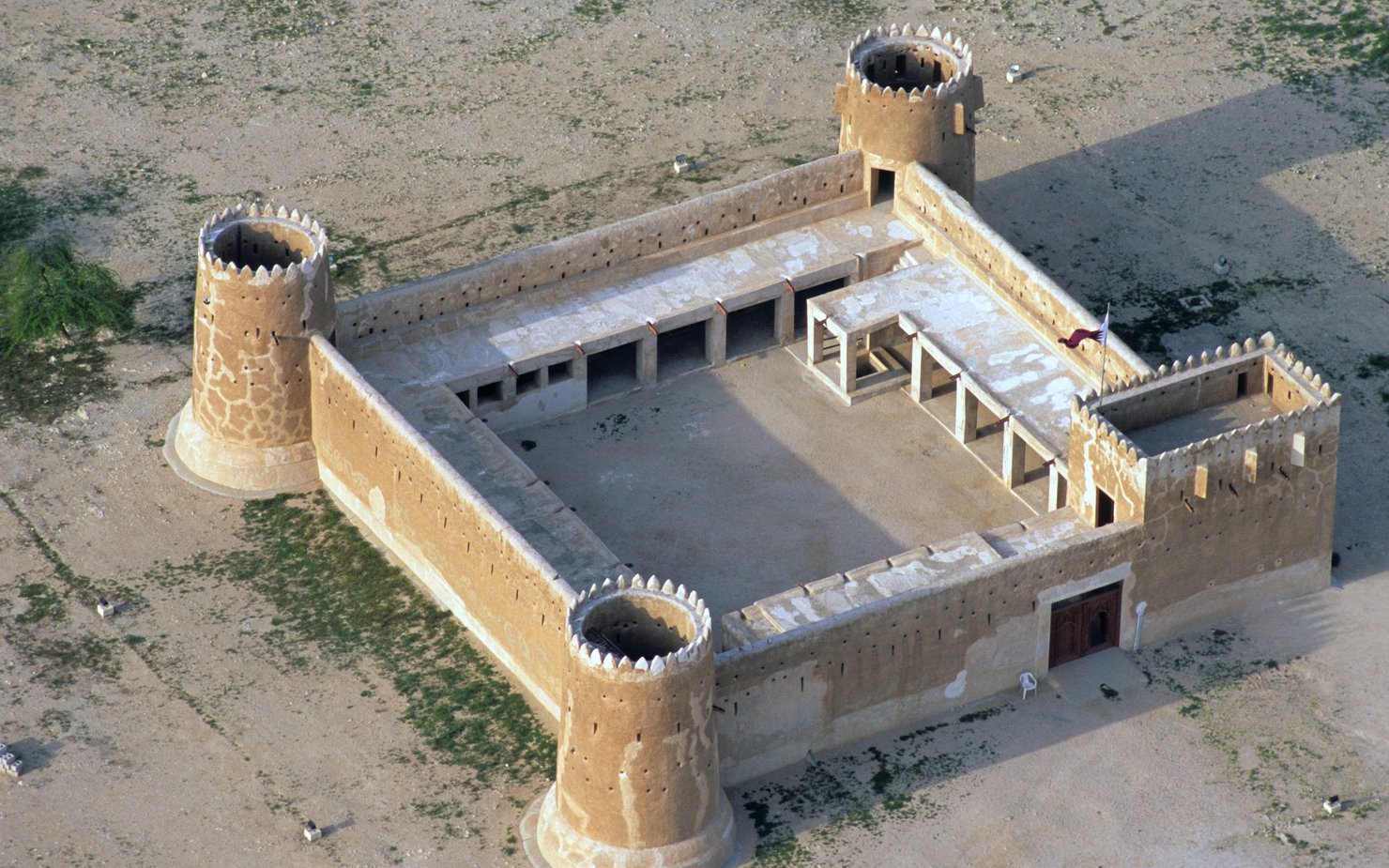 An aerial view of the fortifying walls and towers of the Al Zubarah Fort