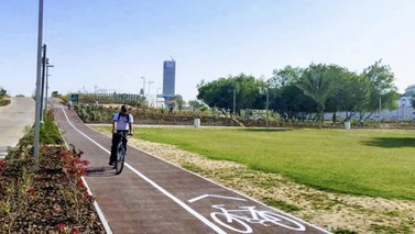 A cycylist at the popular Al Bidda Park