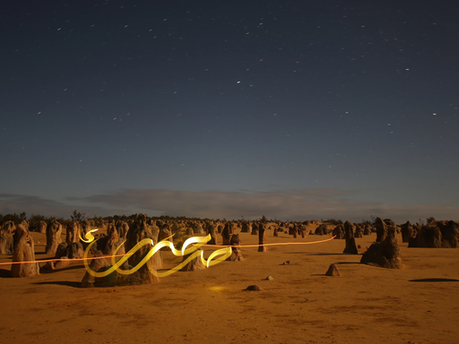 Light calligraphy in dessert