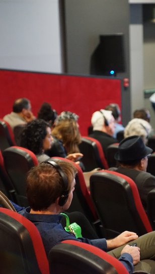 Attendees to a public talk at the Fire Station Cinema.