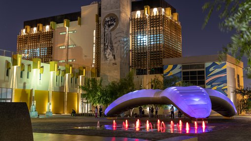 External view of Fire Station: Artist in Residence illuminated at night