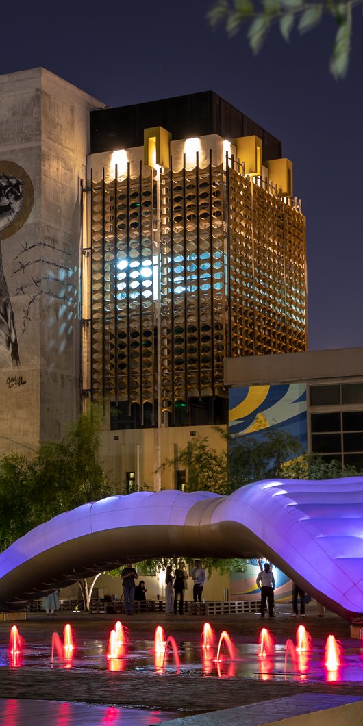 External view of Fire Station: Artist in Residence illuminated at night