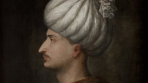 An oil painting of a mustached man in side profile, with a white turban.