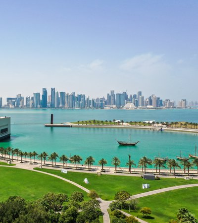 A view of the Museum of Islamic Art with the iconic Doha skyline and the corniche right behind it