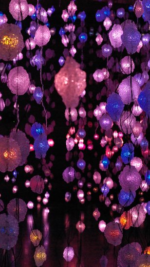 Artwork by Pipilotti Rist of hanging lights in pink, purple and blue