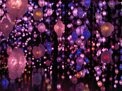 Artwork by Pipilotti Rist of hanging lights in pink, purple and blue