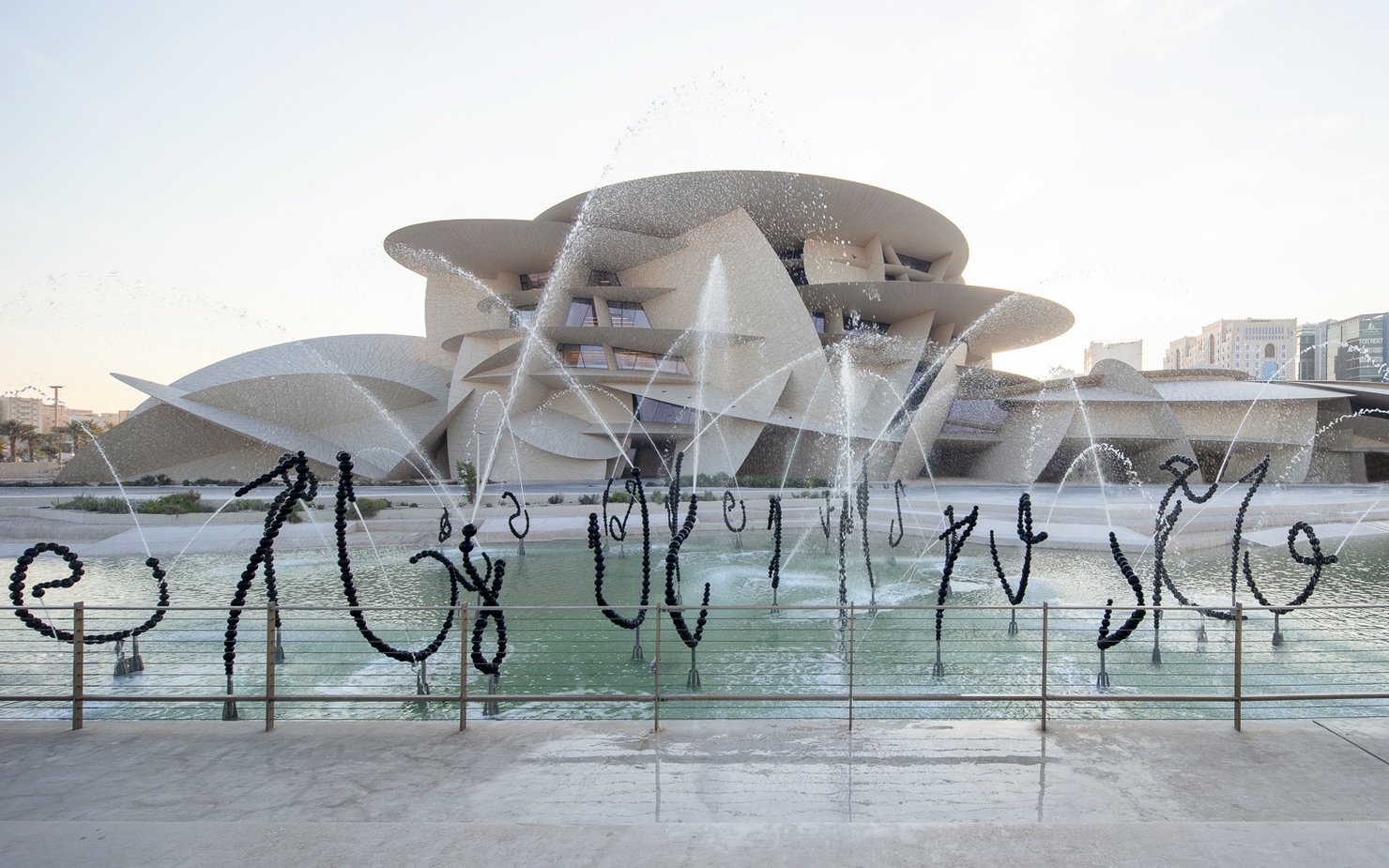 A wide-angle shot of the Alpha fountain spraying water out of its bead-like structure